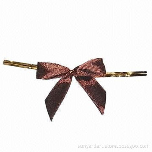 Twist tie bow, comes in brown color